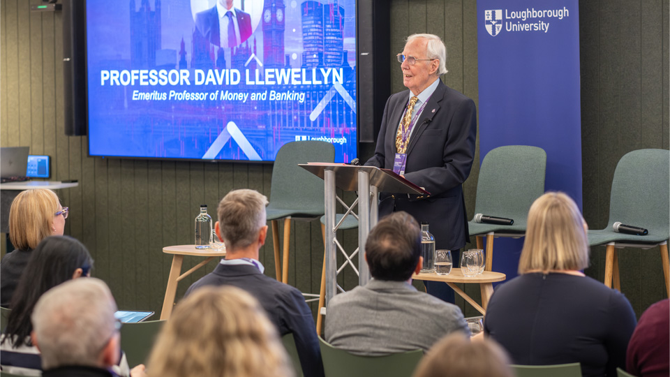 Professor David Llewellyn addresses an audience of Loughborough alumni and finance sector leaders.